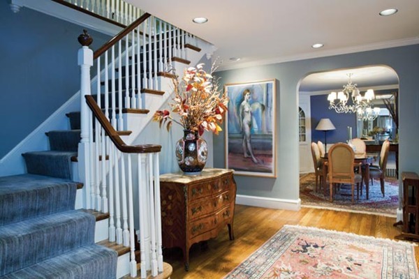 52 Oldham Road Newton, MA 02465 - Photo 8 of 11 a view of a livingroom with furniture stairs and a chandelier
