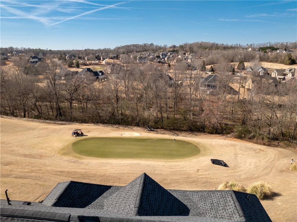119 Turnberry Road Anderson, SC 29621 - Photo 5 of 50 This aerial view showcases a residential community nestled beside a golf course.