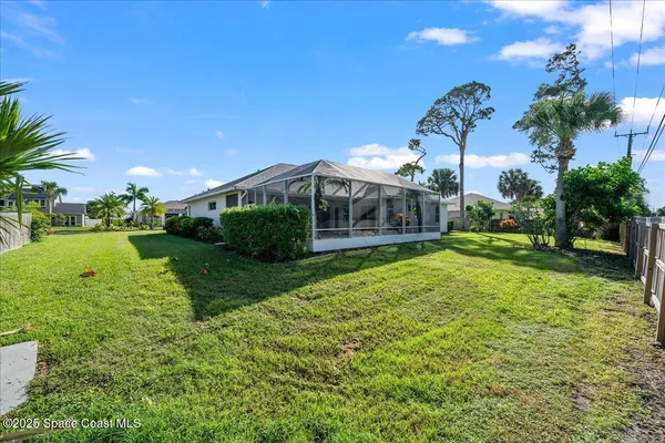a view of a house with a big yard