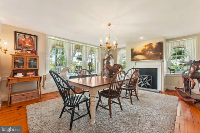 a bedroom with two beds and a flat screen tv