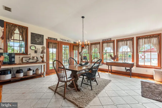 a bedroom with a bed and a tv in it