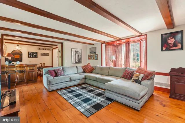 a bed room with a bed and a chandelier