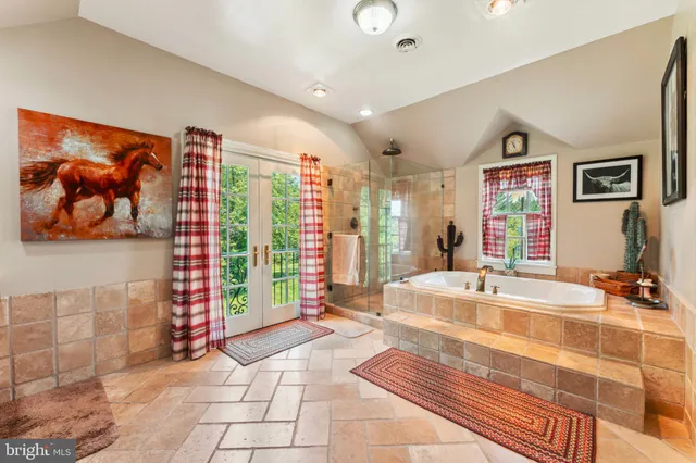 a view of a patio with a table chairs and a backyard