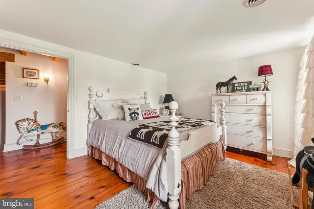 an aerial view of residential house with outdoor space and swimming pool