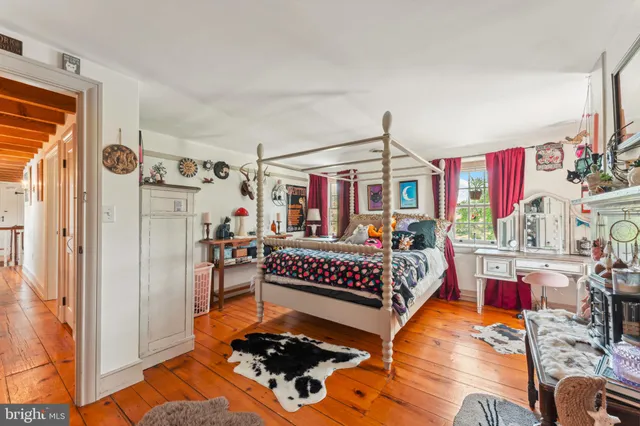 an aerial view of a house with a garden