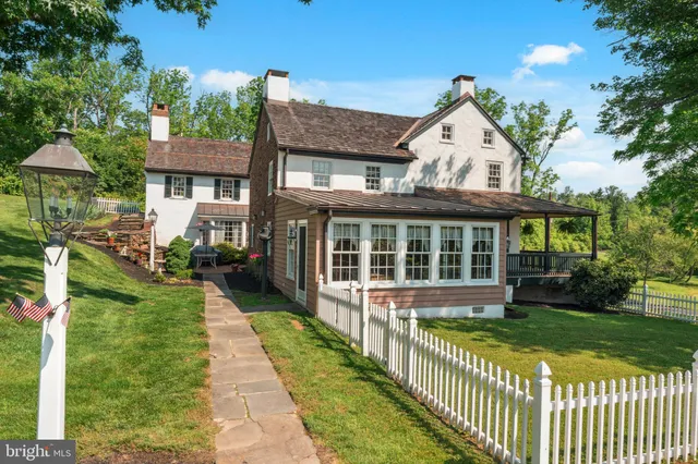 a backyard of a house with seating space
