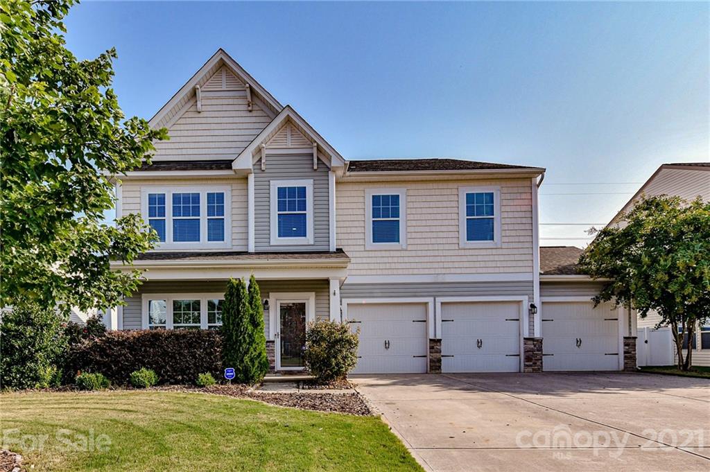 8074 Bryson Road Indian Land, SC 29707 - Photo 2 of 46 a front view of a house with garden