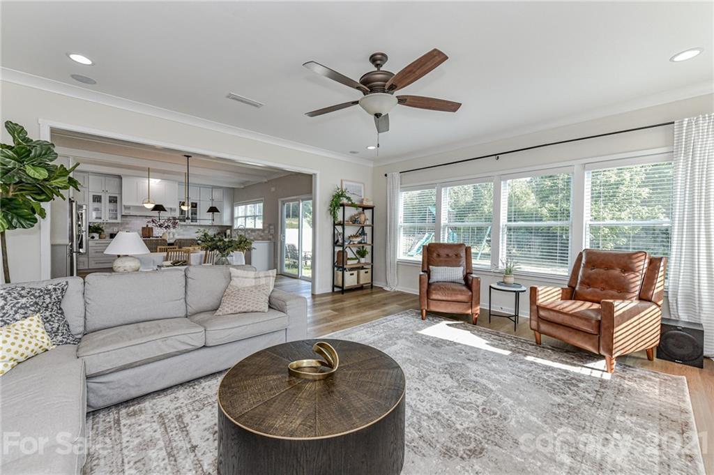 8074 Bryson Road Indian Land, SC 29707 - Photo 12 of 46 a living room with furniture and a large window