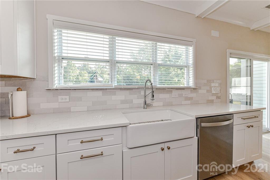 8074 Bryson Road Indian Land, SC 29707 - Photo 21 of 46 a kitchen with a sink and cabinets