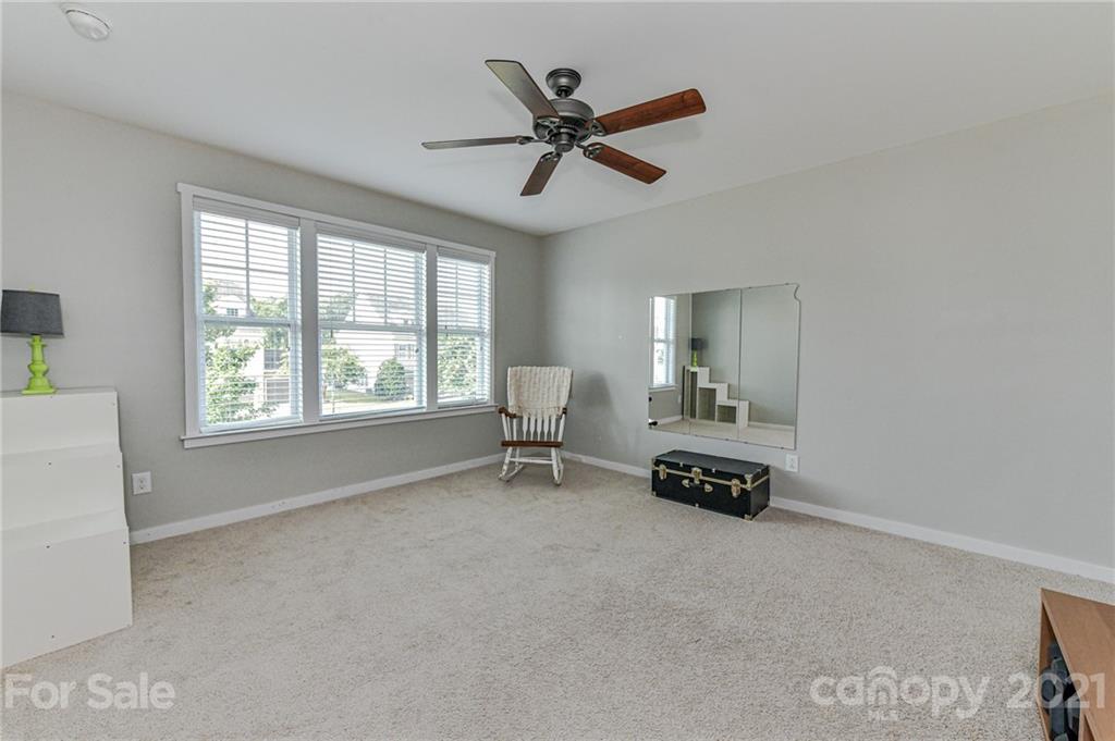 8074 Bryson Road Indian Land, SC 29707 - Photo 33 of 46 a living room with furniture and a window