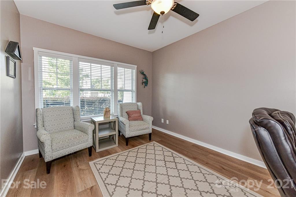 8074 Bryson Road Indian Land, SC 29707 - Photo 7 of 46 a bedroom with furniture and a large window