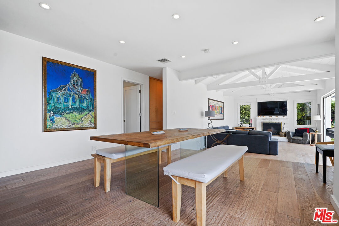 27861 Winding Way Malibu, CA 90265 - Photo 14 of 36 a view of a work space with furniture and wooden floor