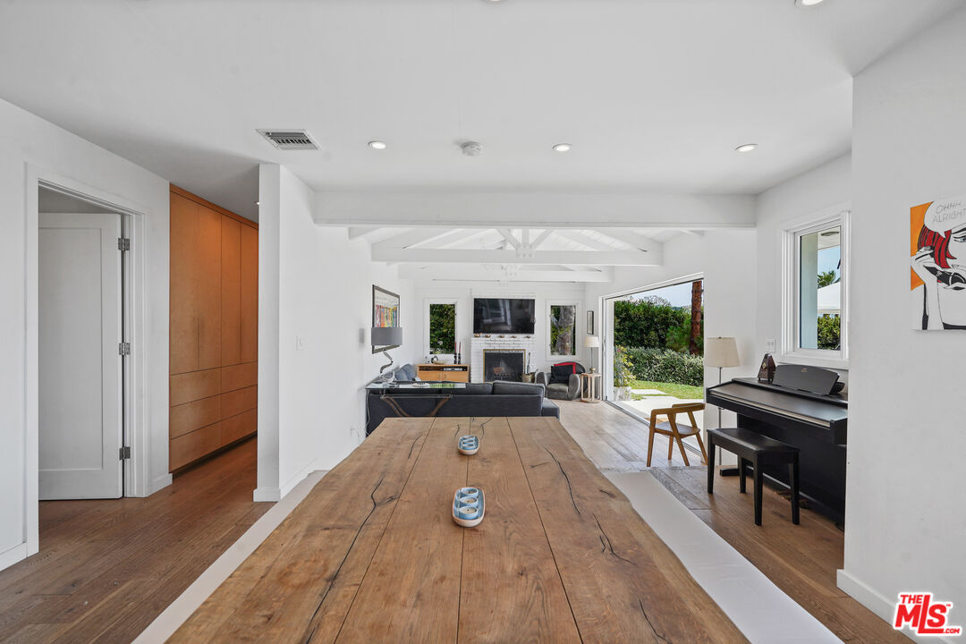 27861 Winding Way Malibu, CA 90265 - Photo 15 of 36 a living room with furniture and a wooden floor