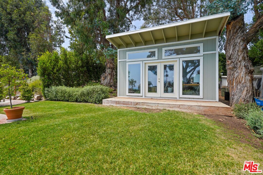 27861 Winding Way Malibu, CA 90265 - Photo 33 of 36 a view of a house with garden and yard
