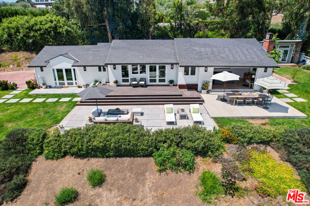 27861 Winding Way Malibu, CA 90265 - Photo 34 of 36 a aerial view of a house with a yard patio and furniture