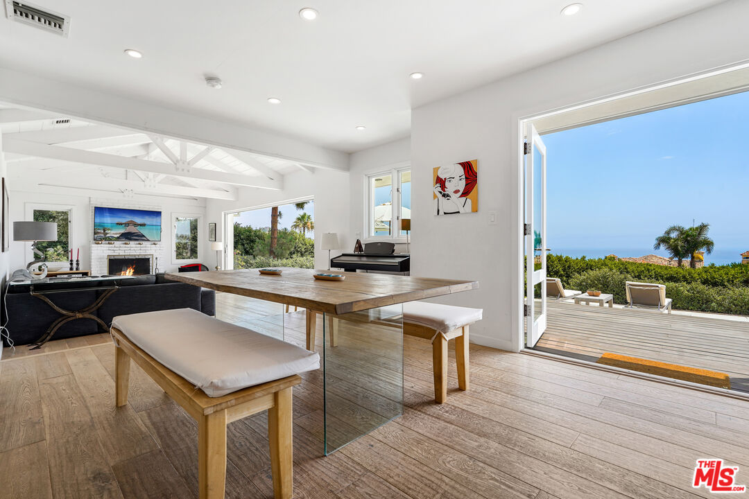 27861 Winding Way Malibu, CA 90265 - Photo 4 of 36 a kitchen with a sink cabinets and wooden floor
