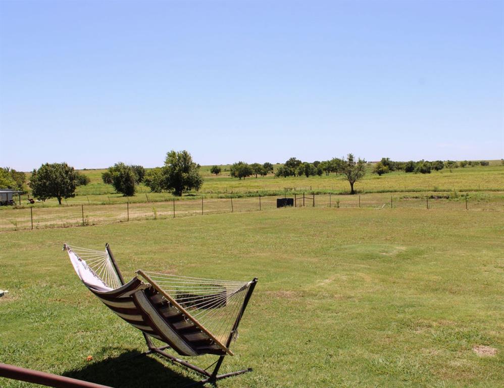 650 Lone Star Road Whitesboro, TX 76273 - Photo 14 of 18 a view of an ocean with a mountain