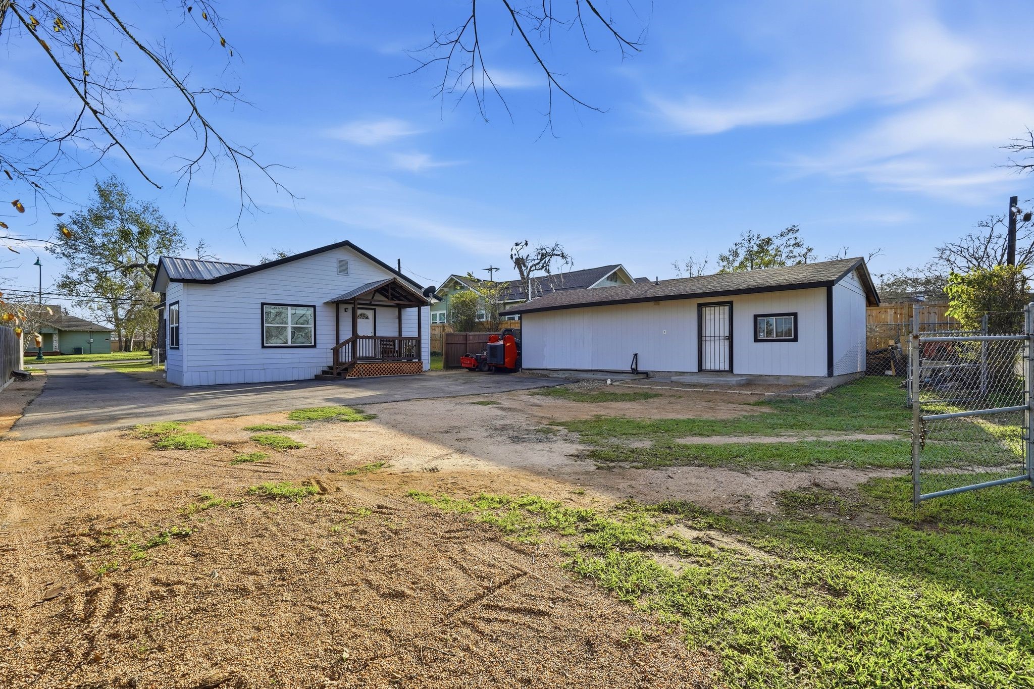 308 East Phillips Street Conroe, TX 77301 - Photo 28 of 36 a front view of a house with a yard