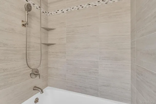 a bathroom with a bathtub