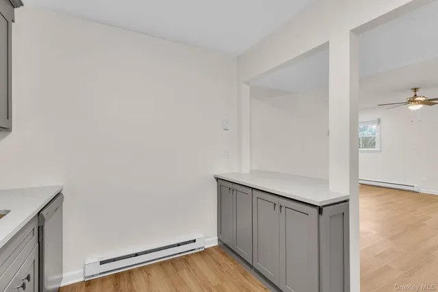 a view of small space with wooden floor