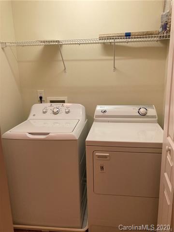 1140 Hammond Drive Matthews, NC 28104 - Photo 12 of 17 a utility room with dryer and washer