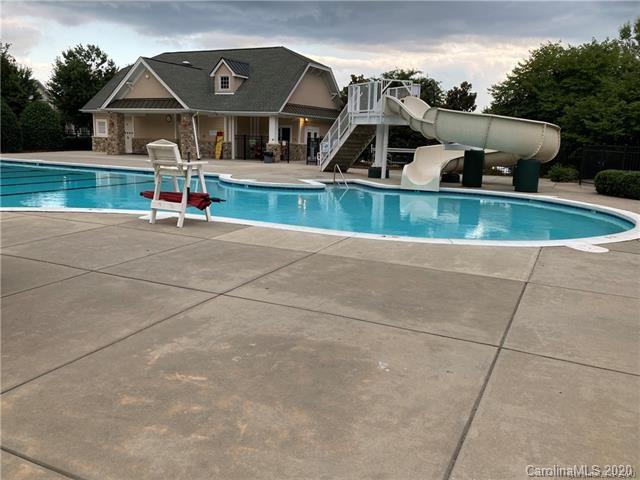 1140 Hammond Drive Matthews, NC 28104 - Photo 15 of 17 an aerial view of a house with swimming pool