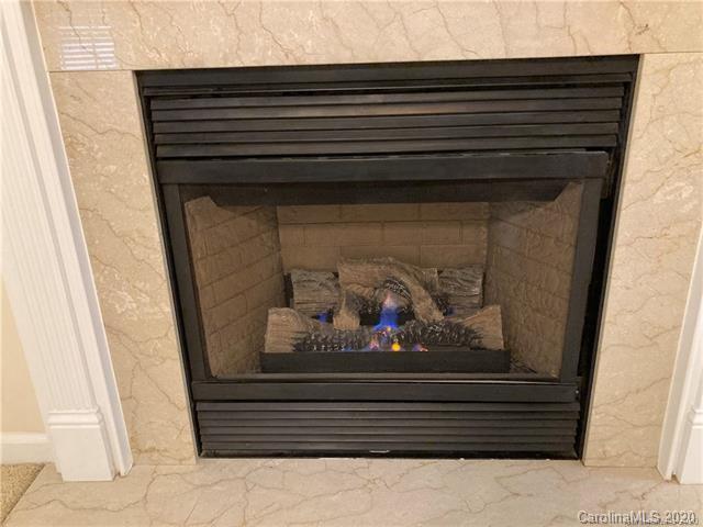 1140 Hammond Drive Matthews, NC 28104 - Photo 4 of 17 a close view of fireplace