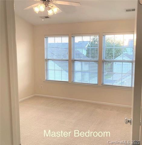 1140 Hammond Drive Matthews, NC 28104 - Photo 9 of 17 a view of an empty room with a window