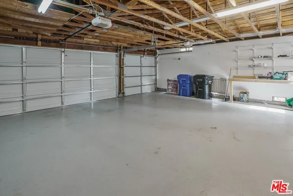 a view of a empty room with storage