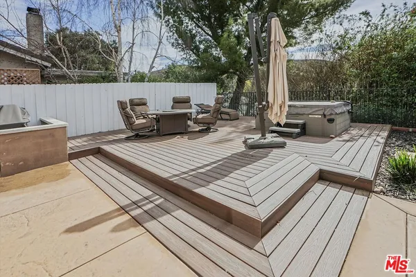 a view of a outdoor space with lounge chair