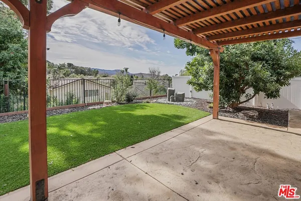 a view of a backyard with garden