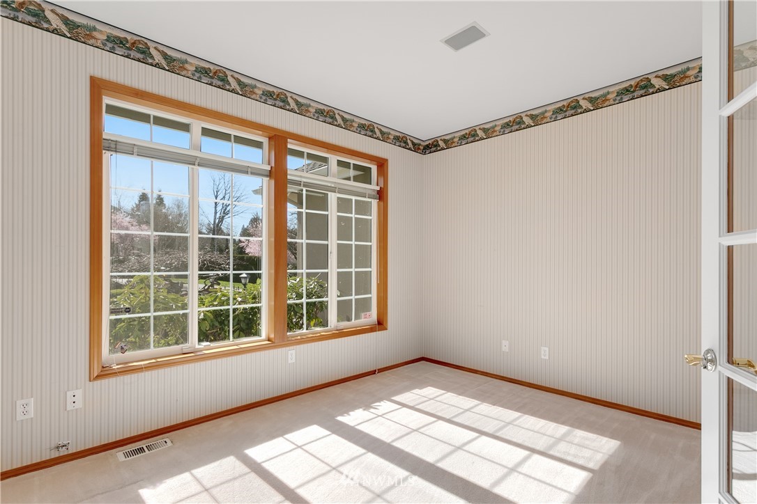 1718 Southeast 7th Court Renton, WA 98057 - Photo 22 of 36 a view of an empty room with a window