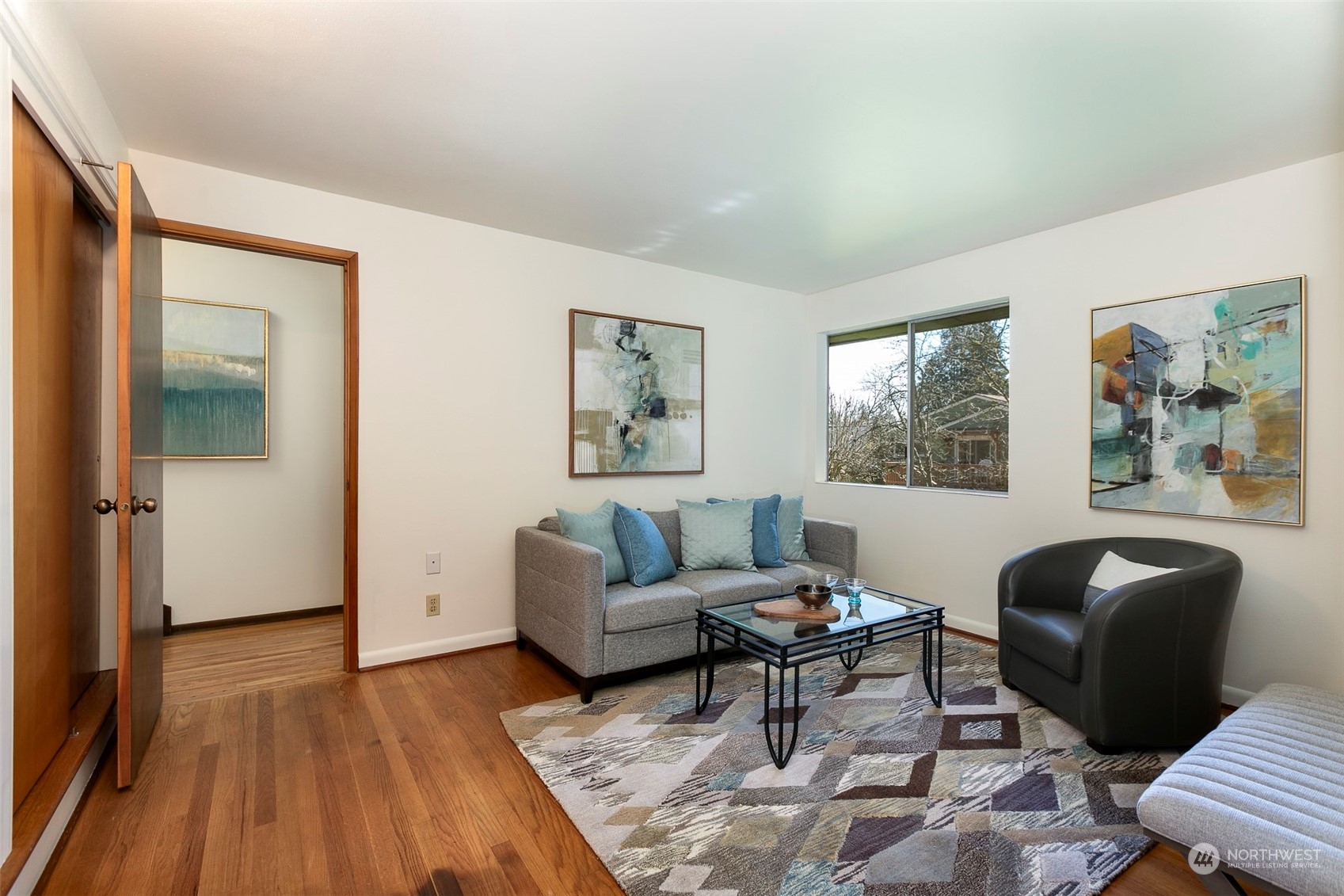 3203 Northeast 88th Street Seattle, WA 98115 - Photo 11 of 28 a living room with furniture and a window