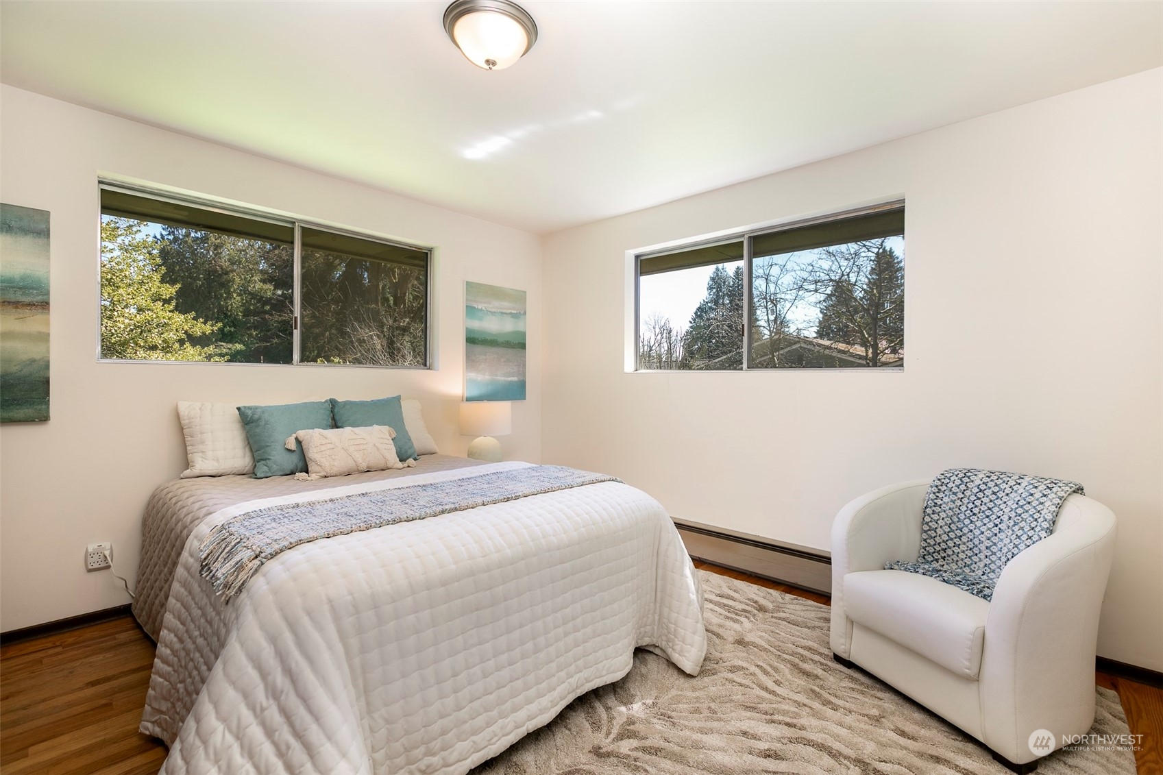 3203 Northeast 88th Street Seattle, WA 98115 - Photo 12 of 28 a bedroom with a bed couch and window