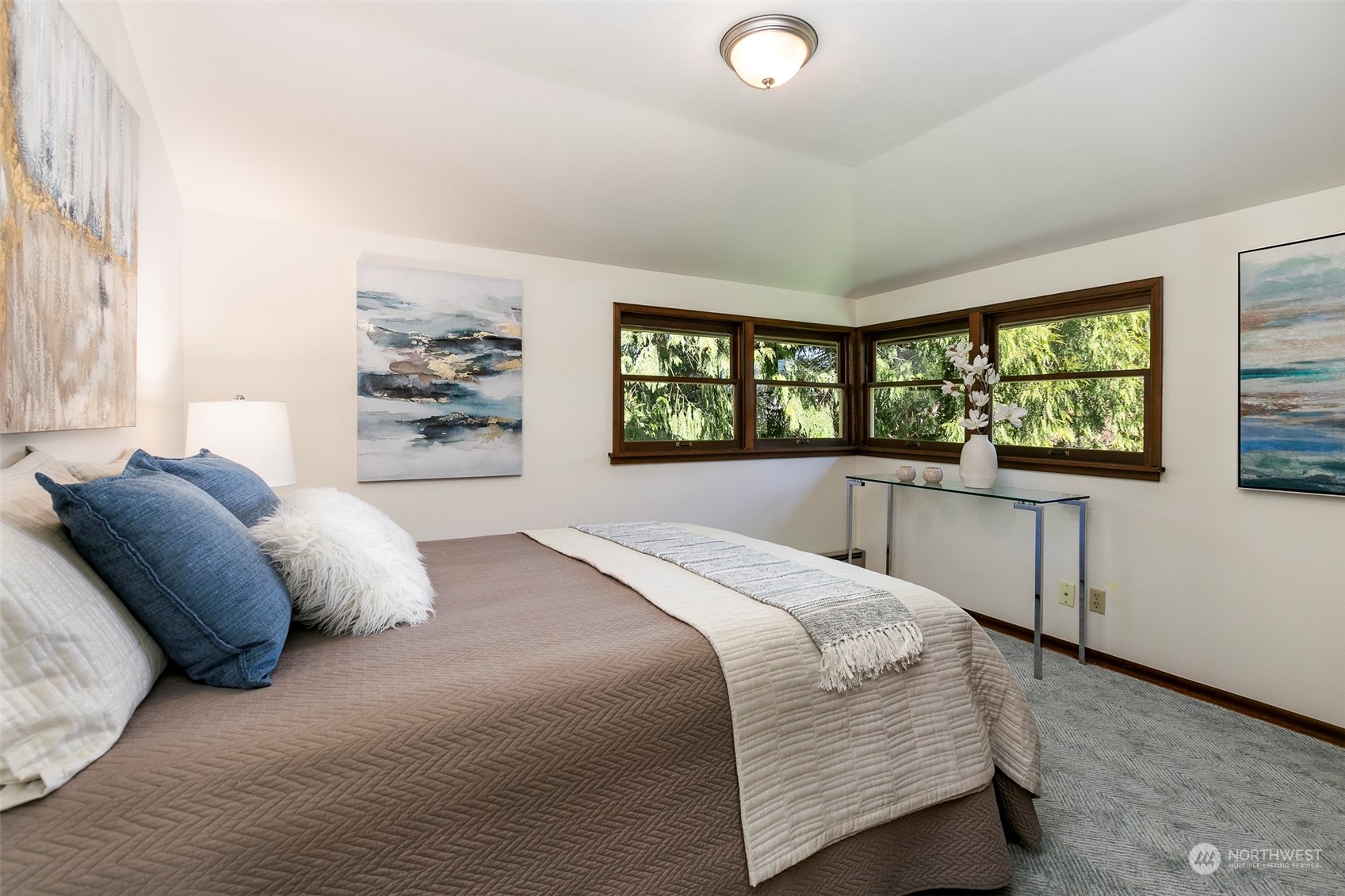 3203 Northeast 88th Street Seattle, WA 98115 - Photo 14 of 28 a bedroom with a bed and a large window