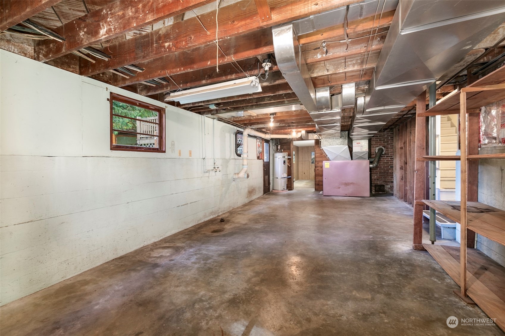 3203 Northeast 88th Street Seattle, WA 98115 - Photo 19 of 28 a view of a room with wooden walls