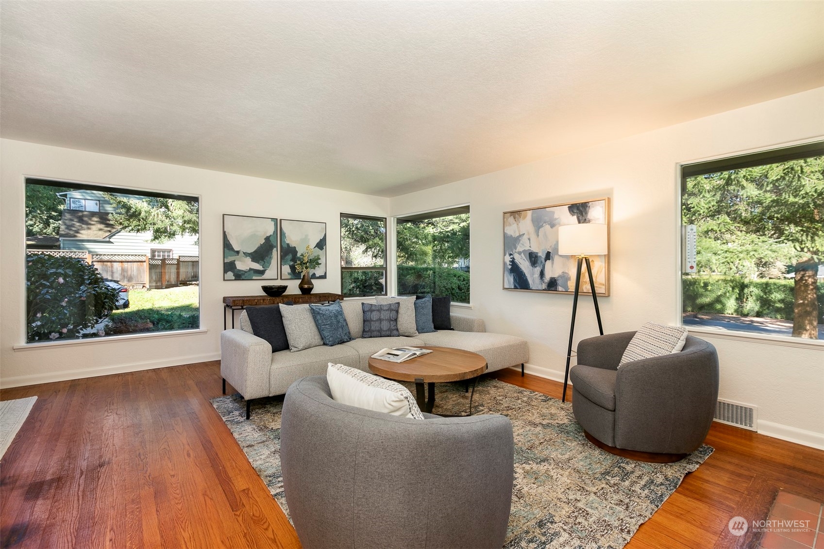 3203 Northeast 88th Street Seattle, WA 98115 - Photo 4 of 28 a living room with furniture and a large window