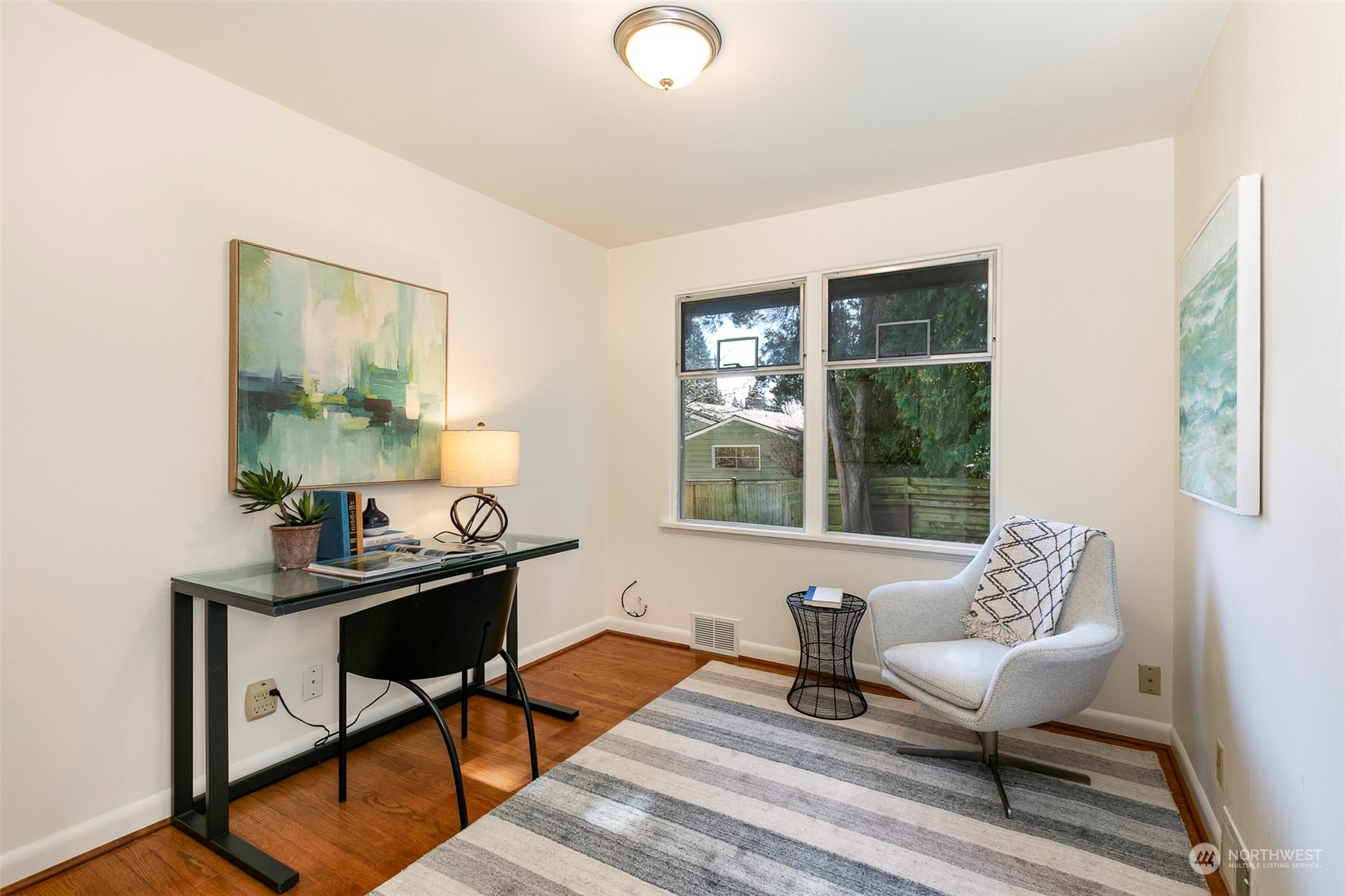 3203 Northeast 88th Street Seattle, WA 98115 - Photo 9 of 28 a living room with furniture and a window