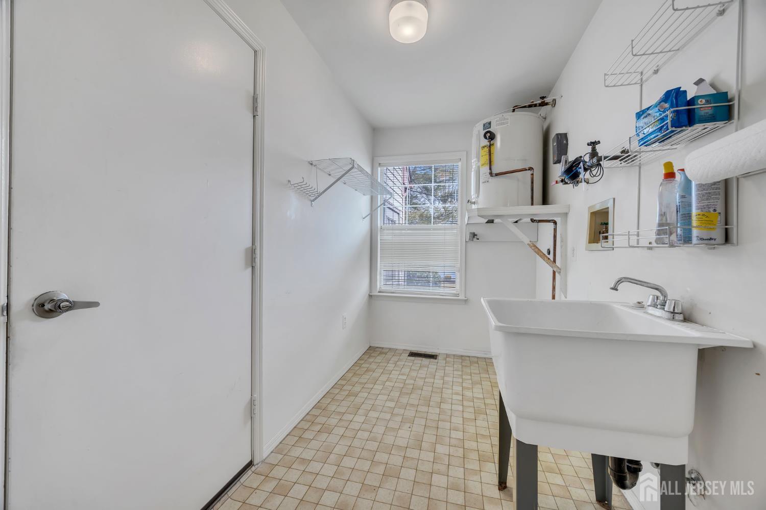 6 Winslow Road Monroe Township, NJ 08831 - Photo 22 of 33 a bathroom with a sink toilet and shower