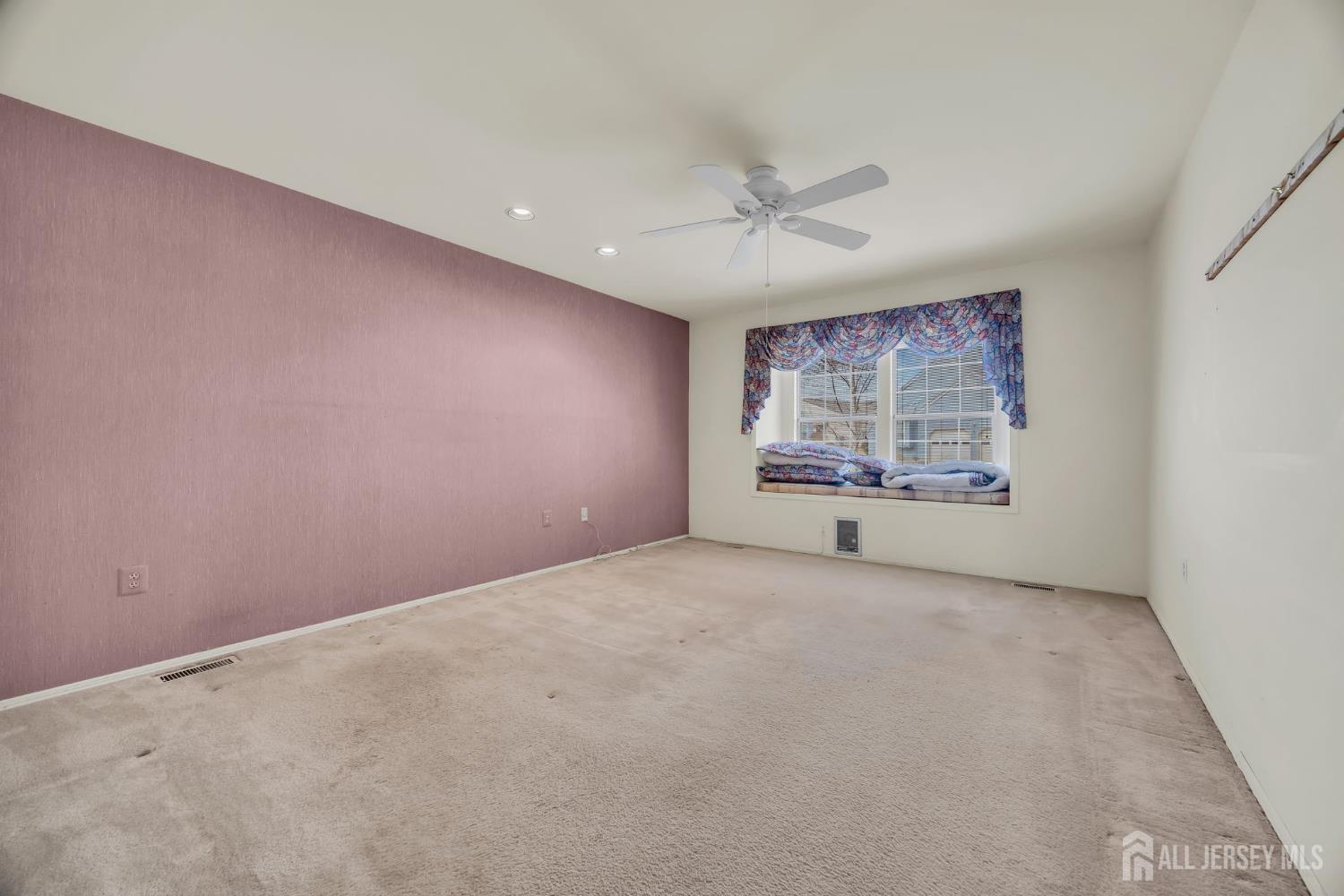 6 Winslow Road Monroe Township, NJ 08831 - Photo 25 of 33 a view of an empty room with a window