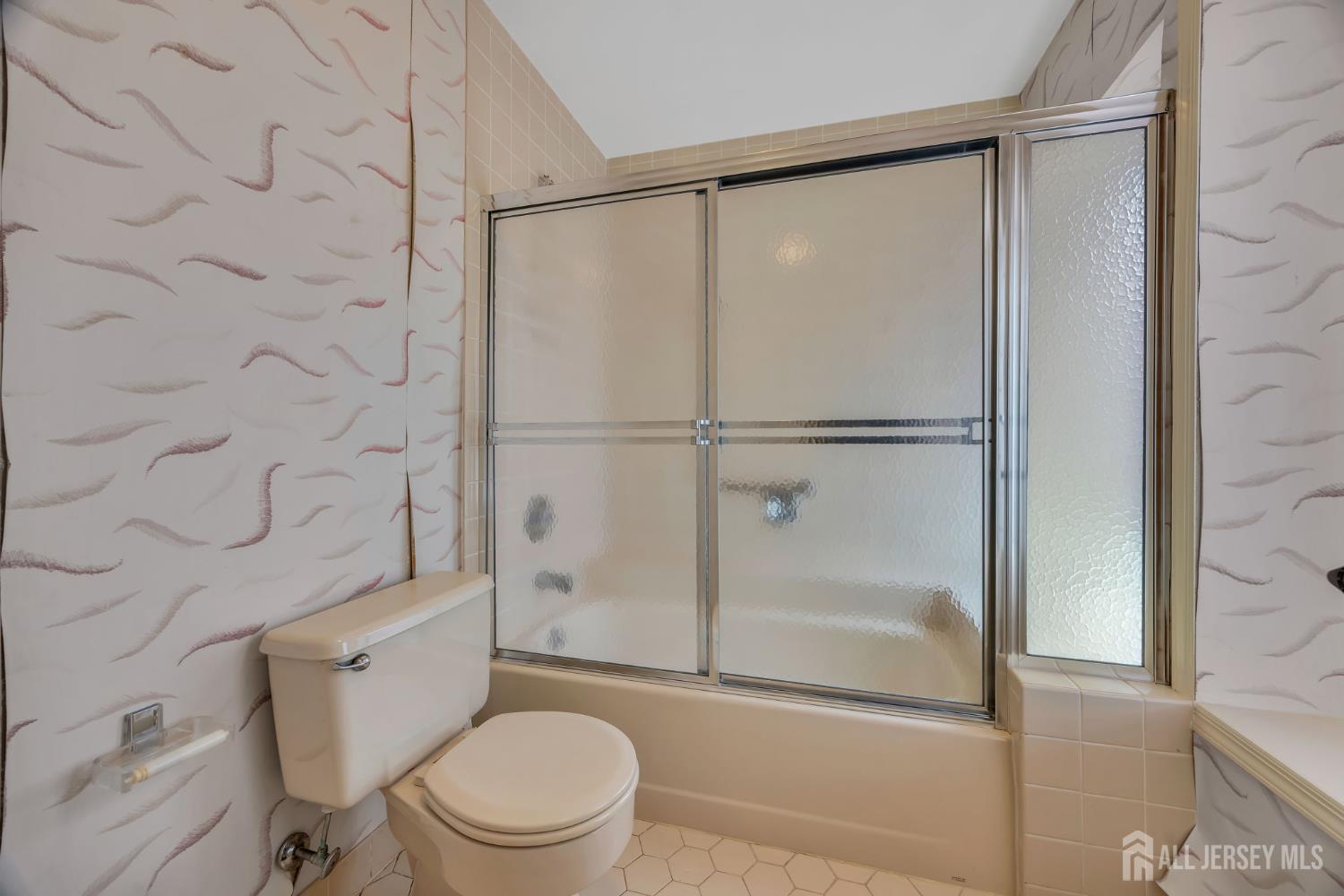 6 Winslow Road Monroe Township, NJ 08831 - Photo 29 of 33 a bathroom with a toilet and a shower