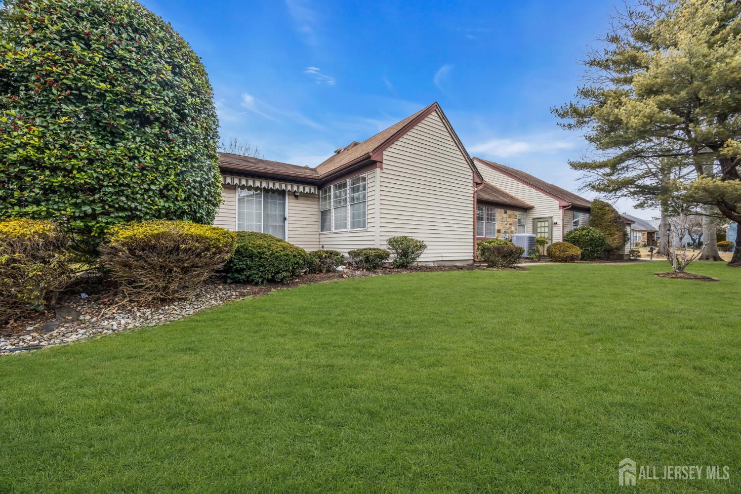 6 Winslow Road Monroe Township, NJ 08831 - Photo 32 of 33 a view of a house with a yard