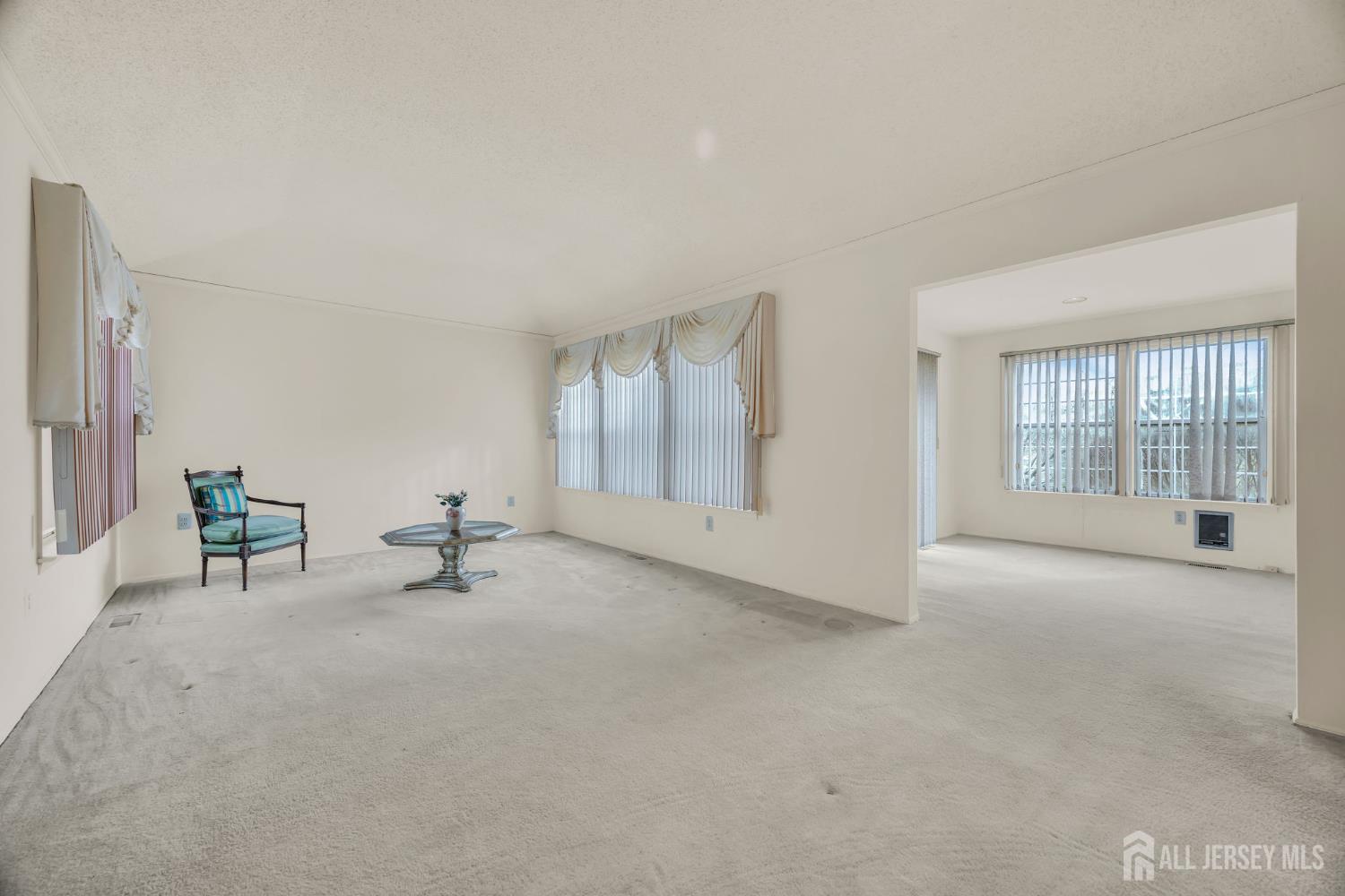 6 Winslow Road Monroe Township, NJ 08831 - Photo 5 of 33 an empty room with windows