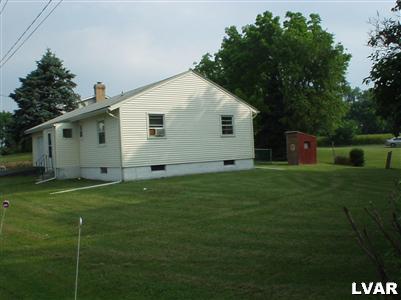 3034 Werner Road Nazareth, PA 18064 - Photo 3 of 11 a backyard of a house with lots of green space