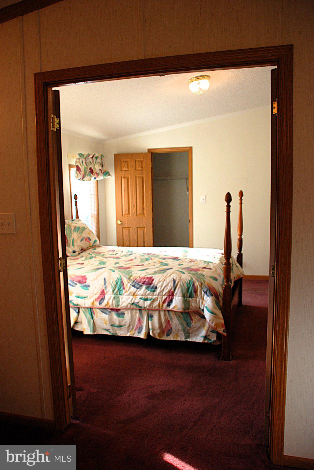 4508 Lewiston Road Bumpass, VA 23024 - Photo 66 of 84 Cozy bedroom with inviting charm.