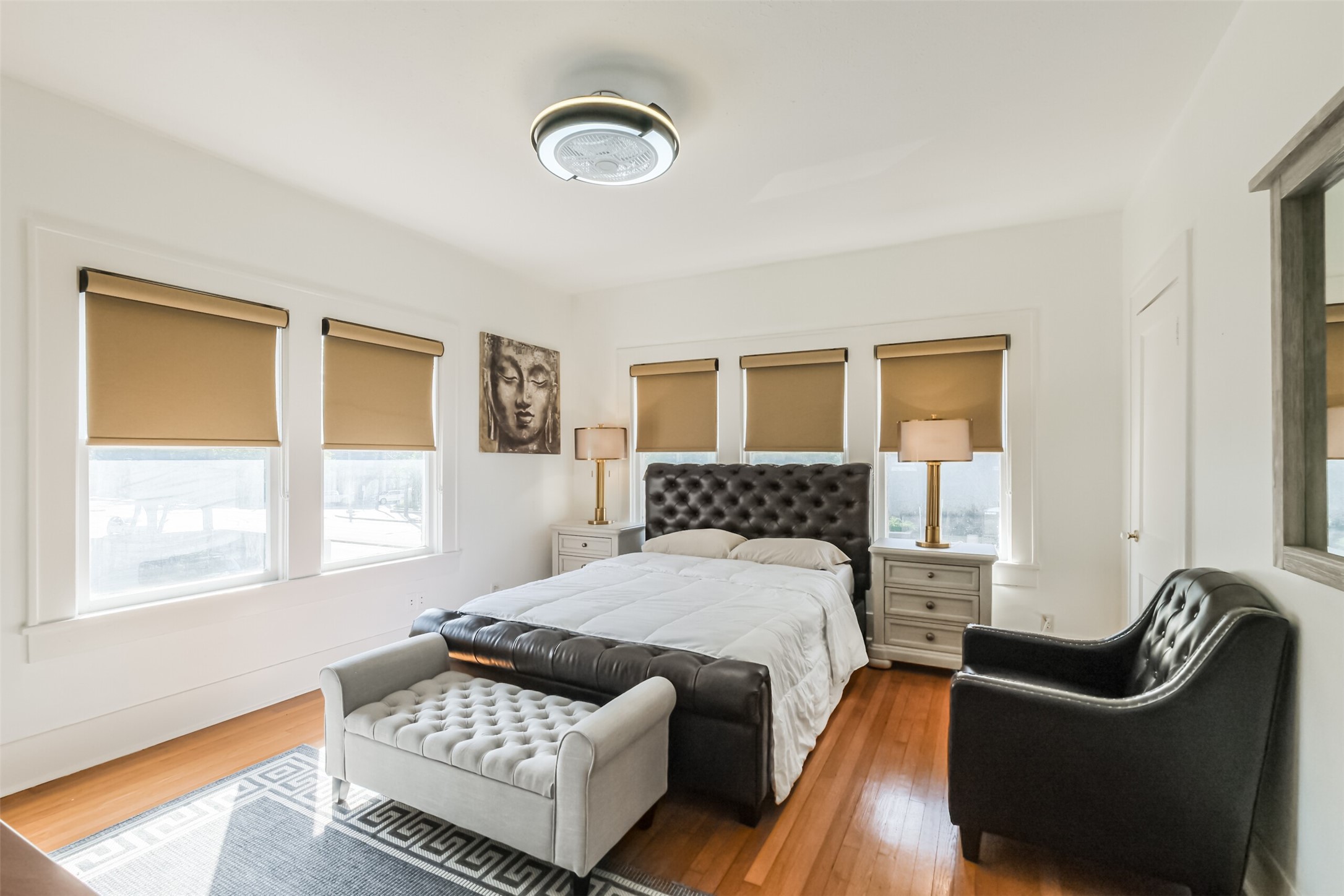 1716 Richmond Avenue, Unit 2 Houston, TX 77098 - Photo 15 of 21 a bedroom with a bed and a couch