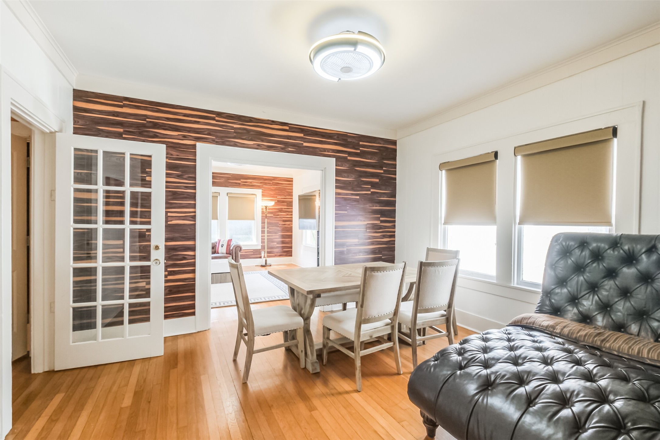 1716 Richmond Avenue, Unit 2 Houston, TX 77098 - Photo 7 of 21 a view of a dining room with furniture and wooden floor