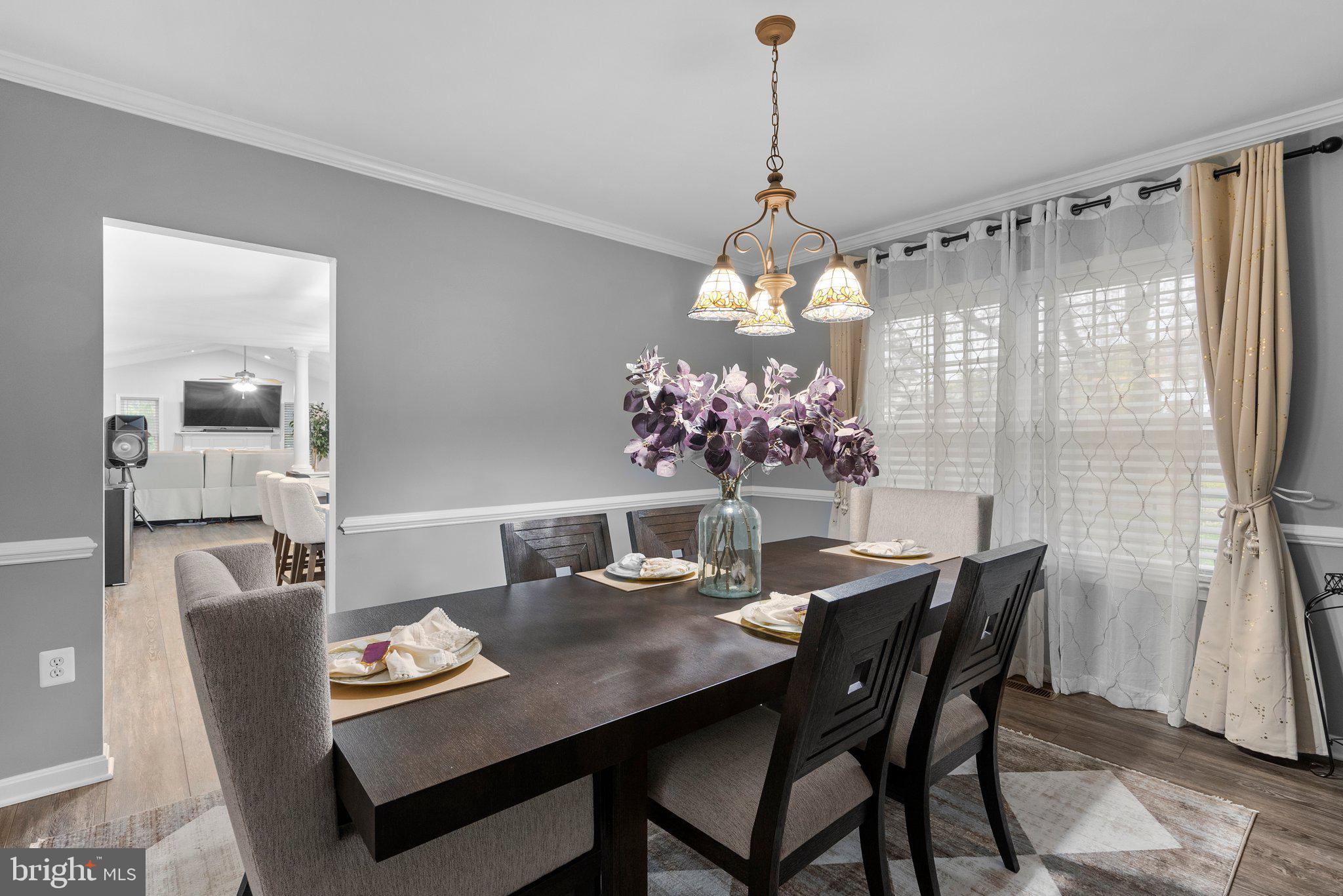 6355 Grant Chapman Drive La Plata, MD 20646 - Photo 11 of 57 a view of a dining room with furniture window and wooden floor