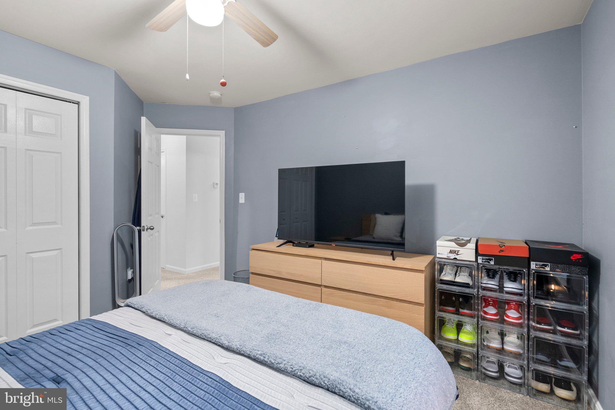 6355 Grant Chapman Drive La Plata, MD 20646 - Photo 32 of 57 a bedroom with a bed and a flat screen tv