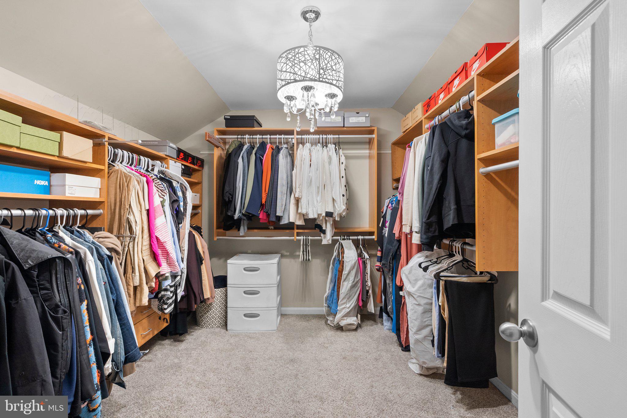 6355 Grant Chapman Drive La Plata, MD 20646 - Photo 43 of 57 a view of walk in closet with clothes and shoes